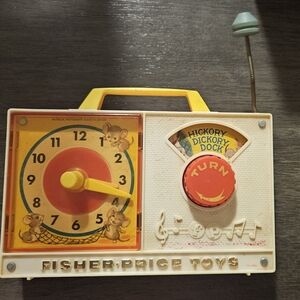 Fisher-Price Classic Musical Clock Toy - Yellow and Red
